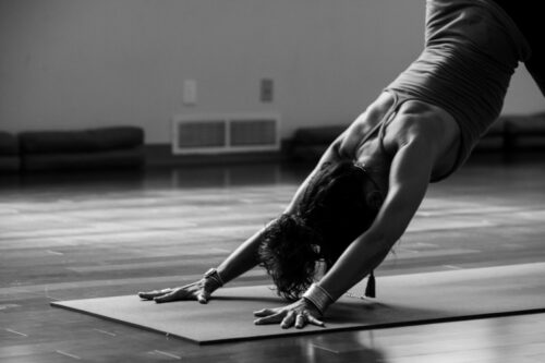 a woman doing a yoga pose